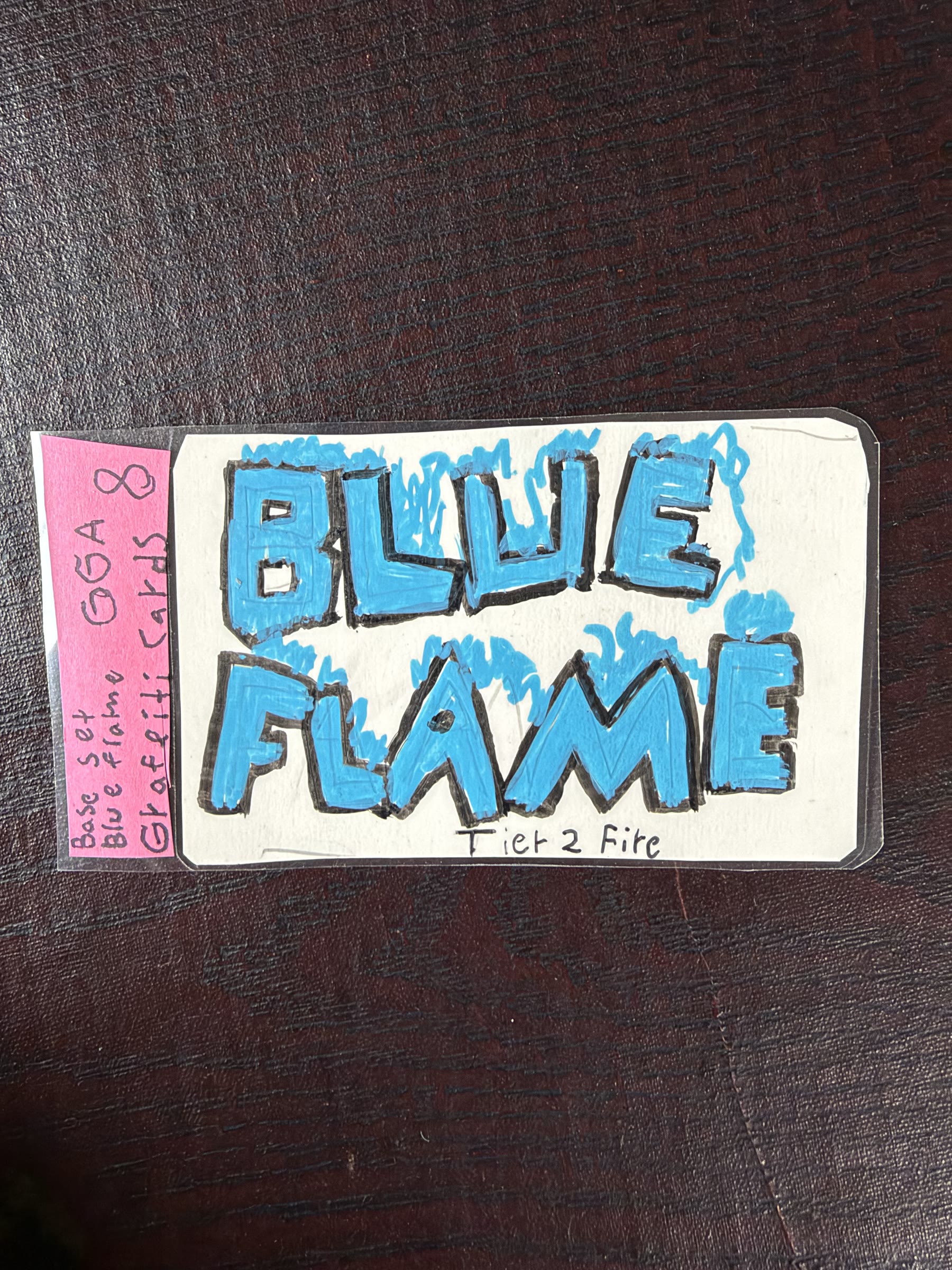 Graded Blue Flame graffiti card in blue marker