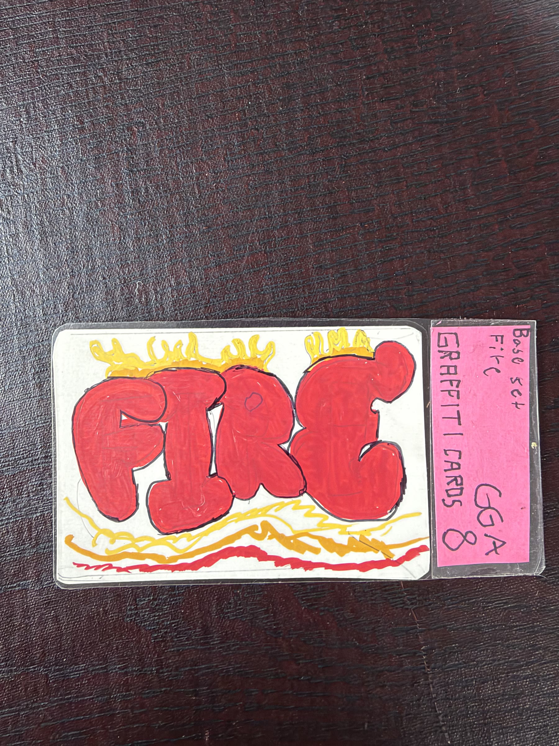 Graded Fire graffiti card in red and yellow marker