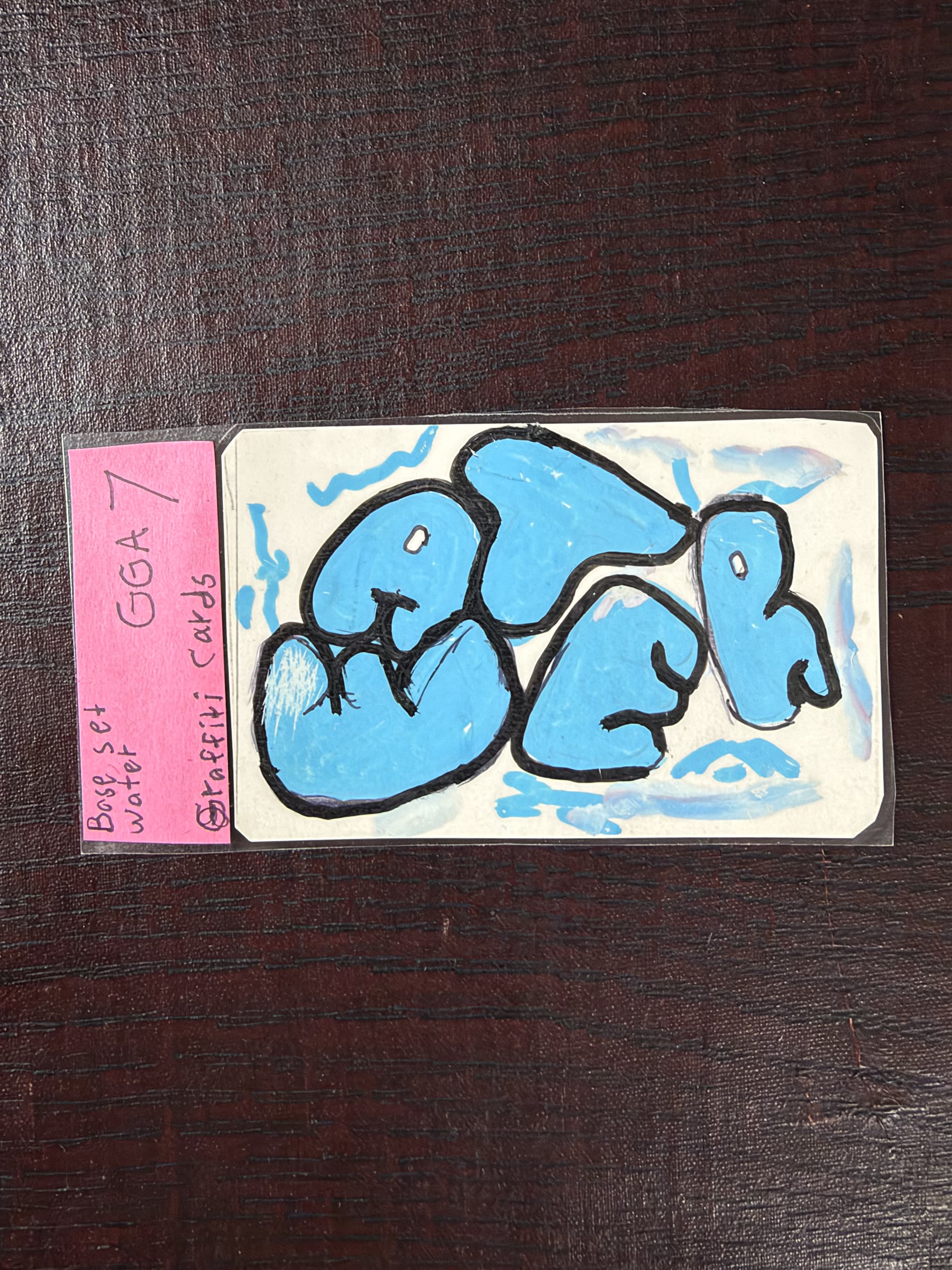 Graded Water graffiti card in blue marker