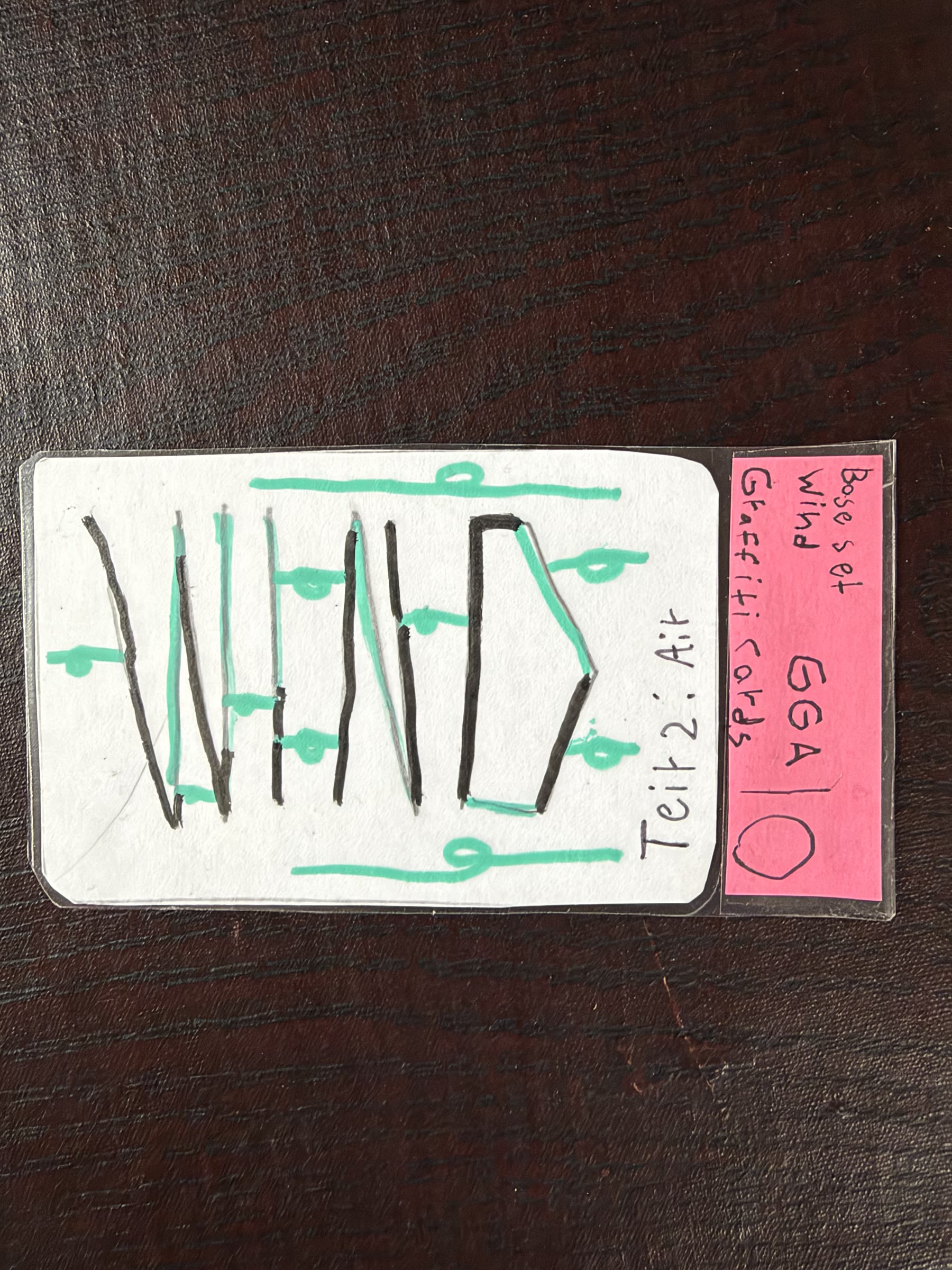 Graded Wind graffiti card in green and black marker